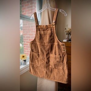 Fable mini skirt overalls in light brow corduroy fabric.